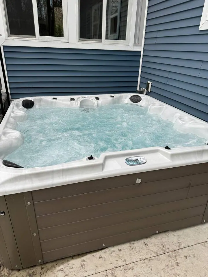 Year-round hot tub on the side of the house