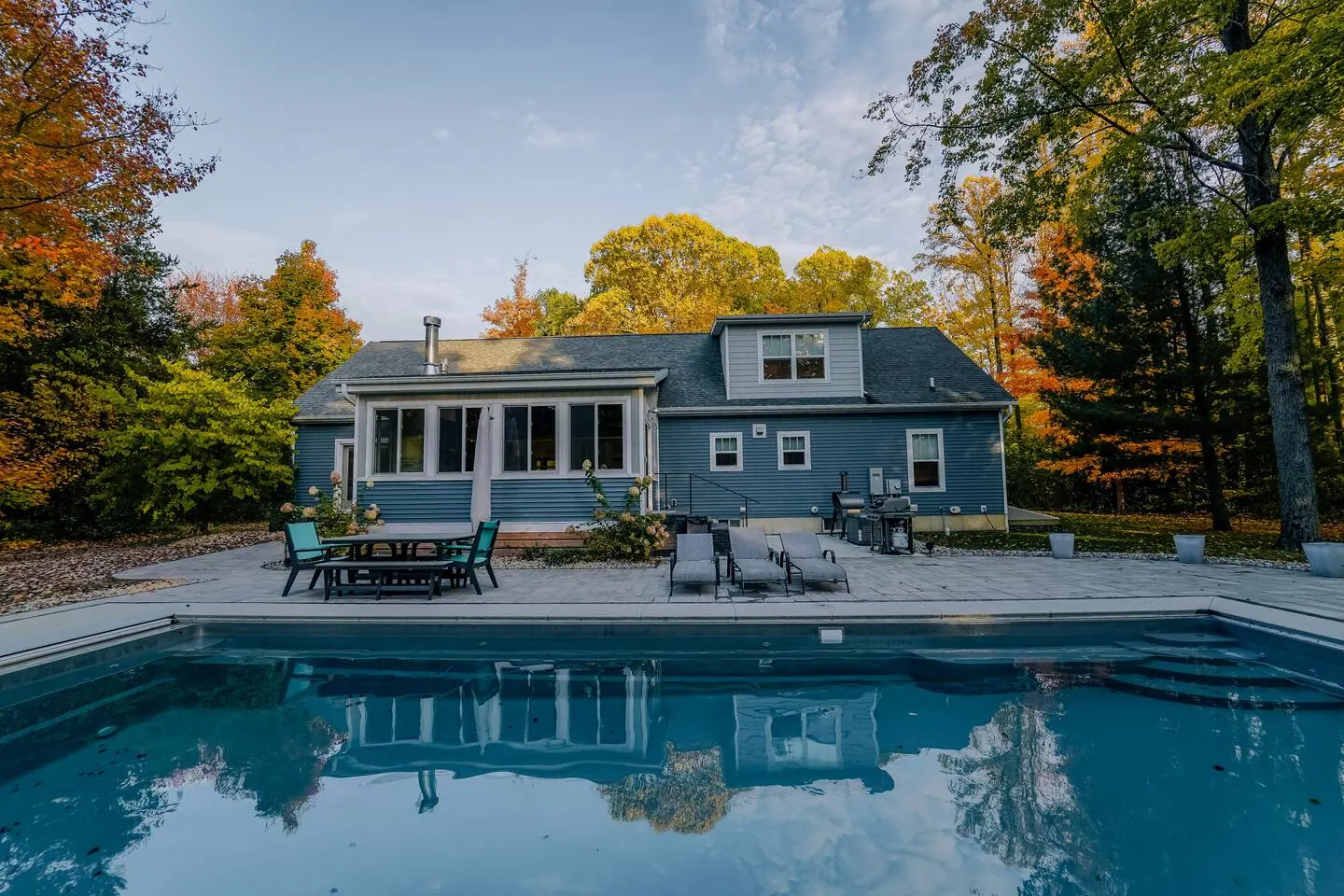 Looking across the pool toward the rear of the house