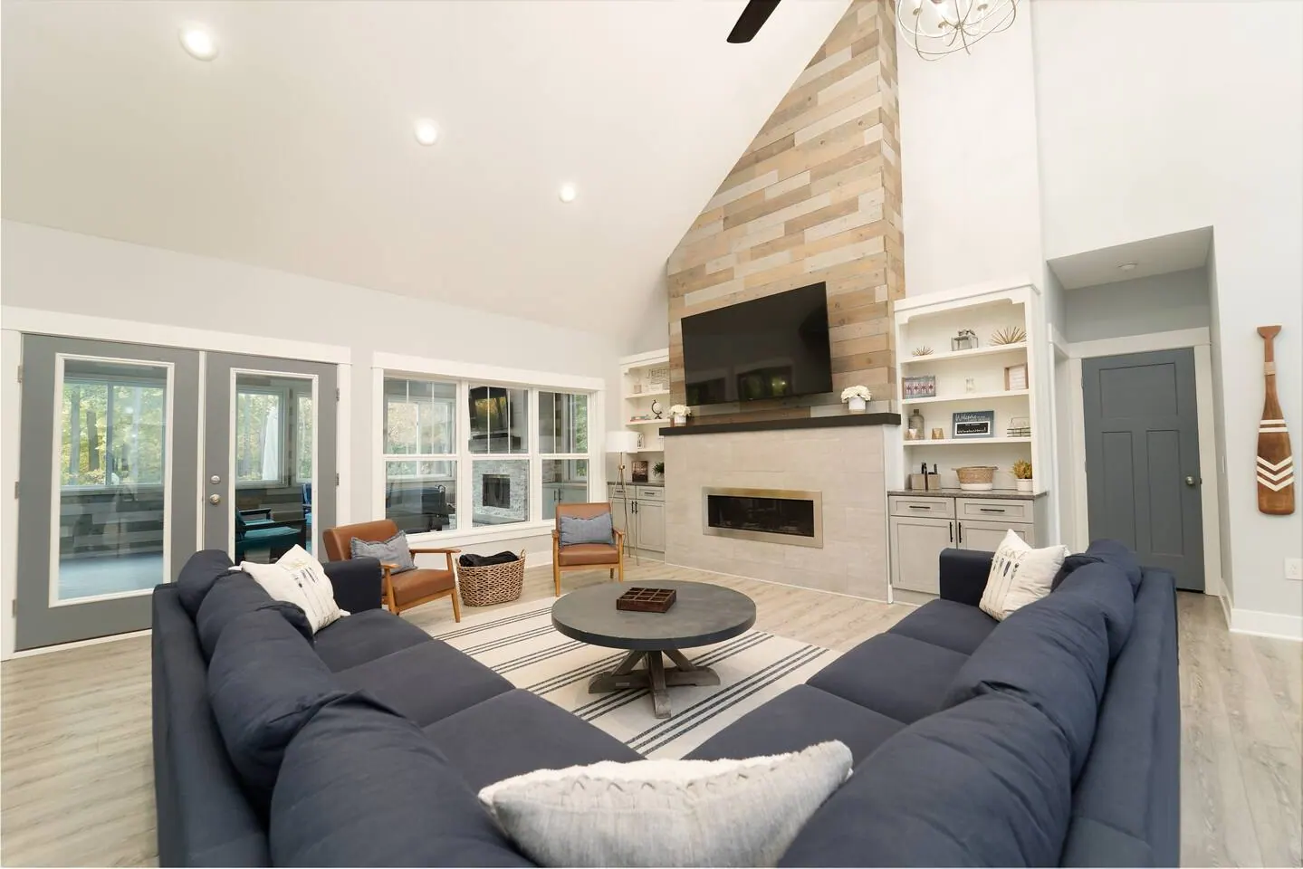 Living room looking toward the kitchen and backyard glass doors